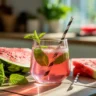 glass of watermelon energy drink with fresh mint