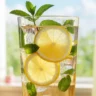 Lemon mint juice served cold with fresh mint and lemon slices